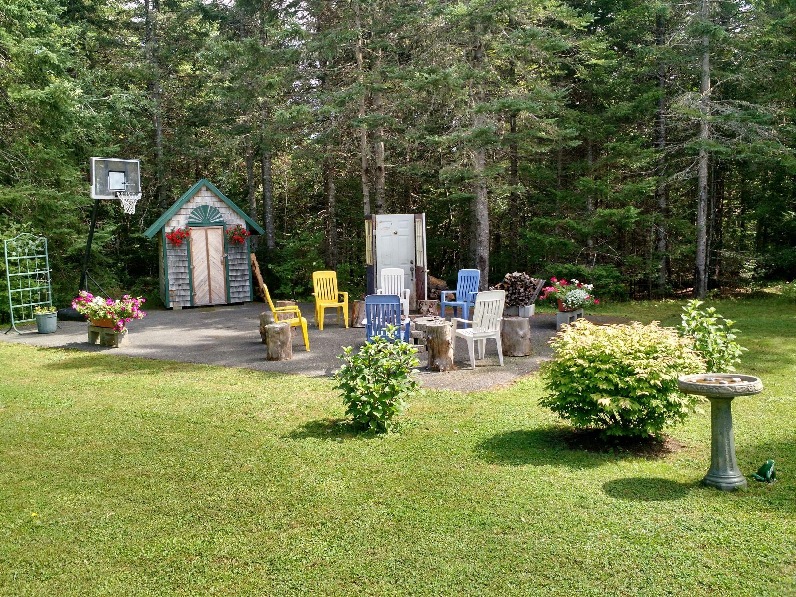 179 Brewer Road Robbinston, ME 04671 - Photo 9 of 55 7 Firepit Courtyard
