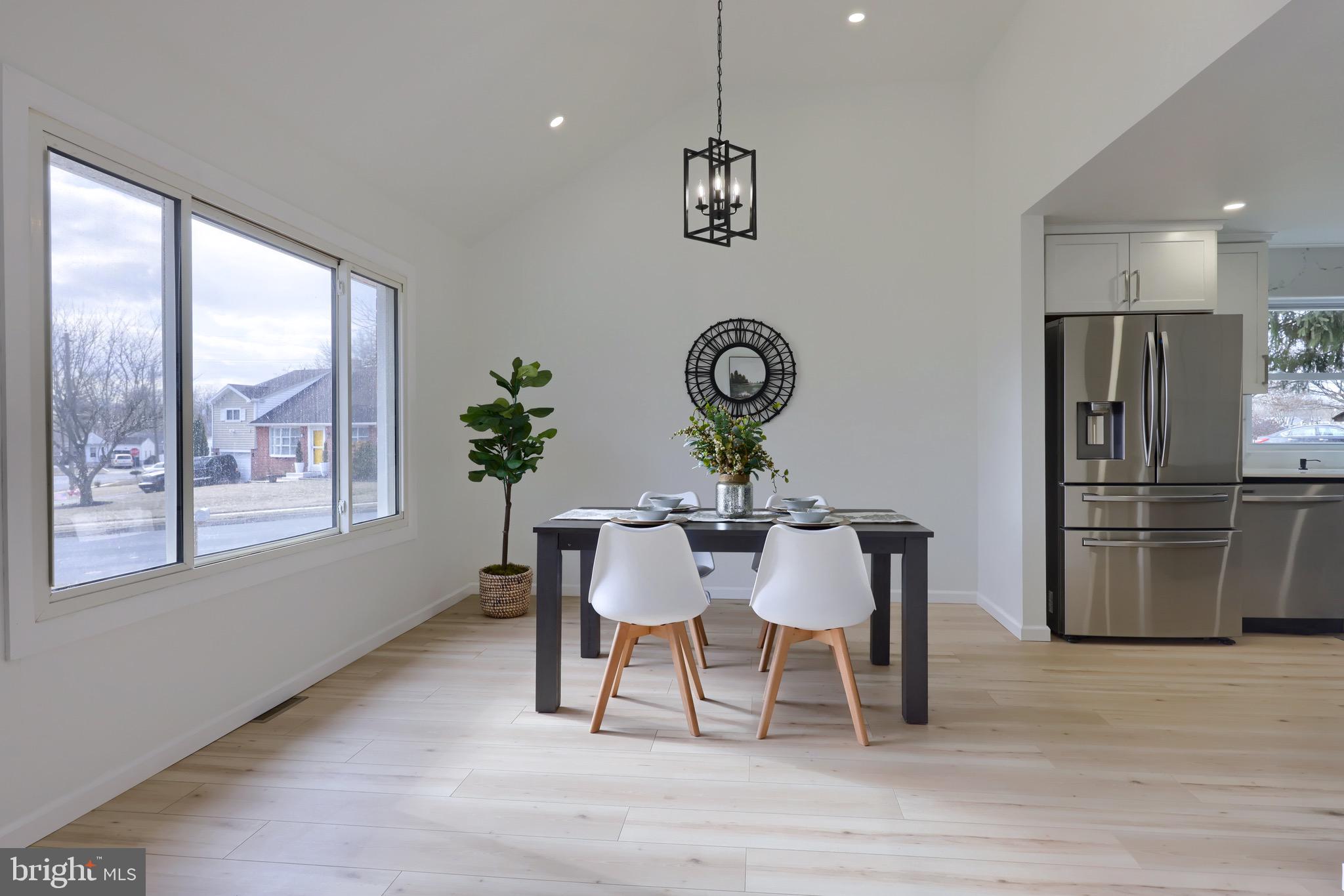 2709 Chapel Road Lancaster, PA 17603 - Photo 13 of 67 a dining room with furniture a window and wooden floor
