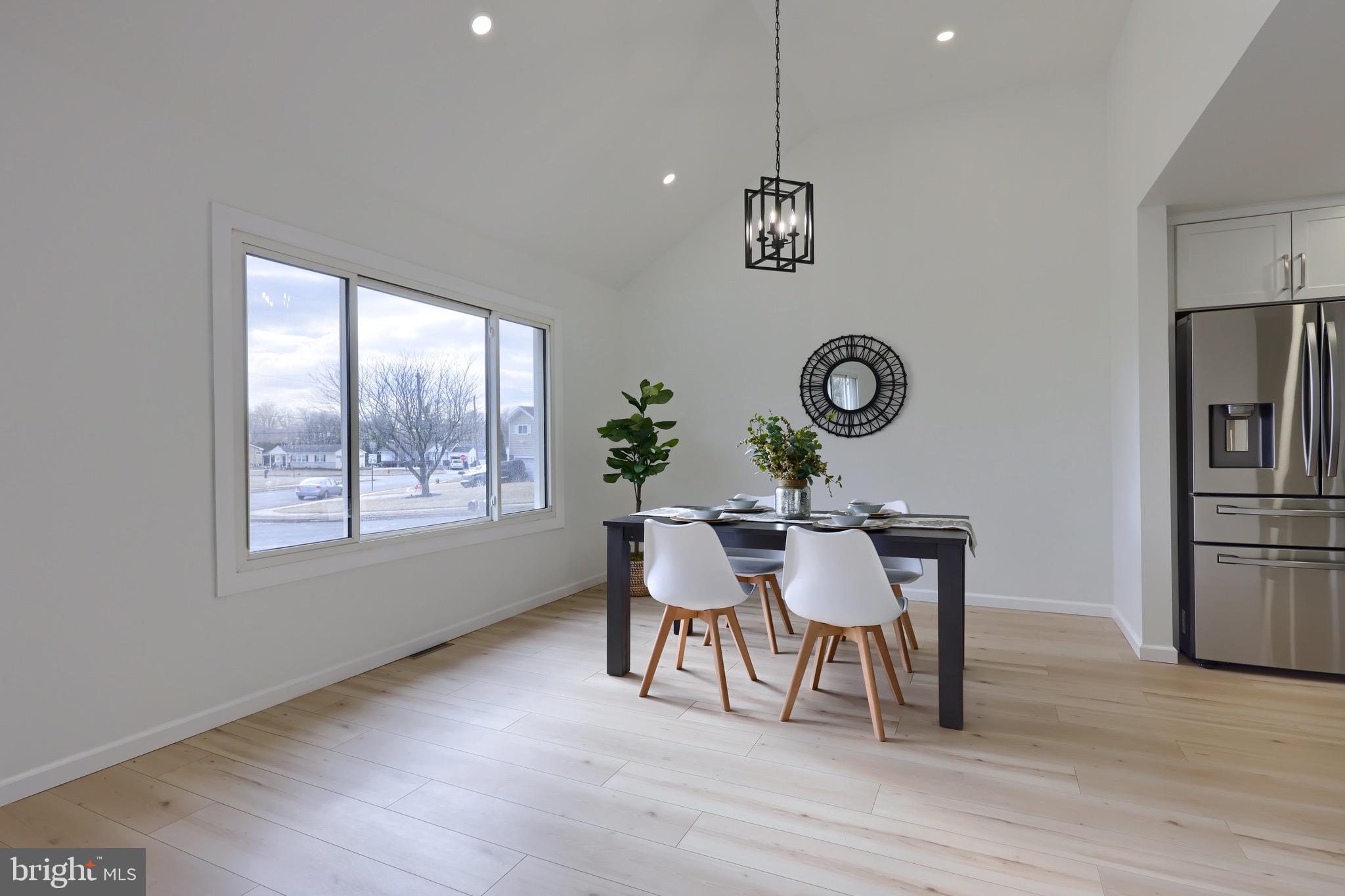 2709 Chapel Road Lancaster, PA 17603 - Photo 14 of 67 a view of a dining room with furniture window and wooden floor