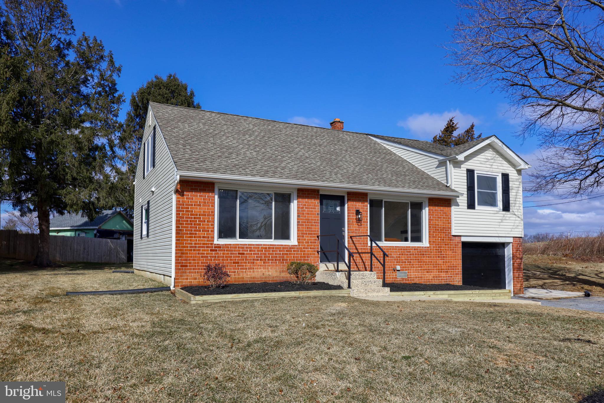 2709 Chapel Road Lancaster, PA 17603 - Photo 3 of 67 a front view of a house with a yard