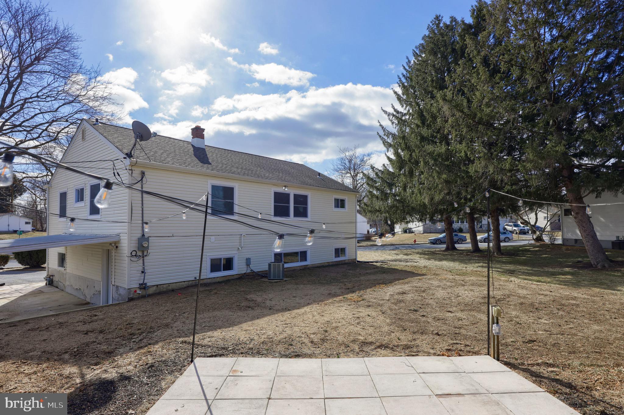 2709 Chapel Road Lancaster, PA 17603 - Photo 57 of 67 a view of a white house that has a tree on the side of it