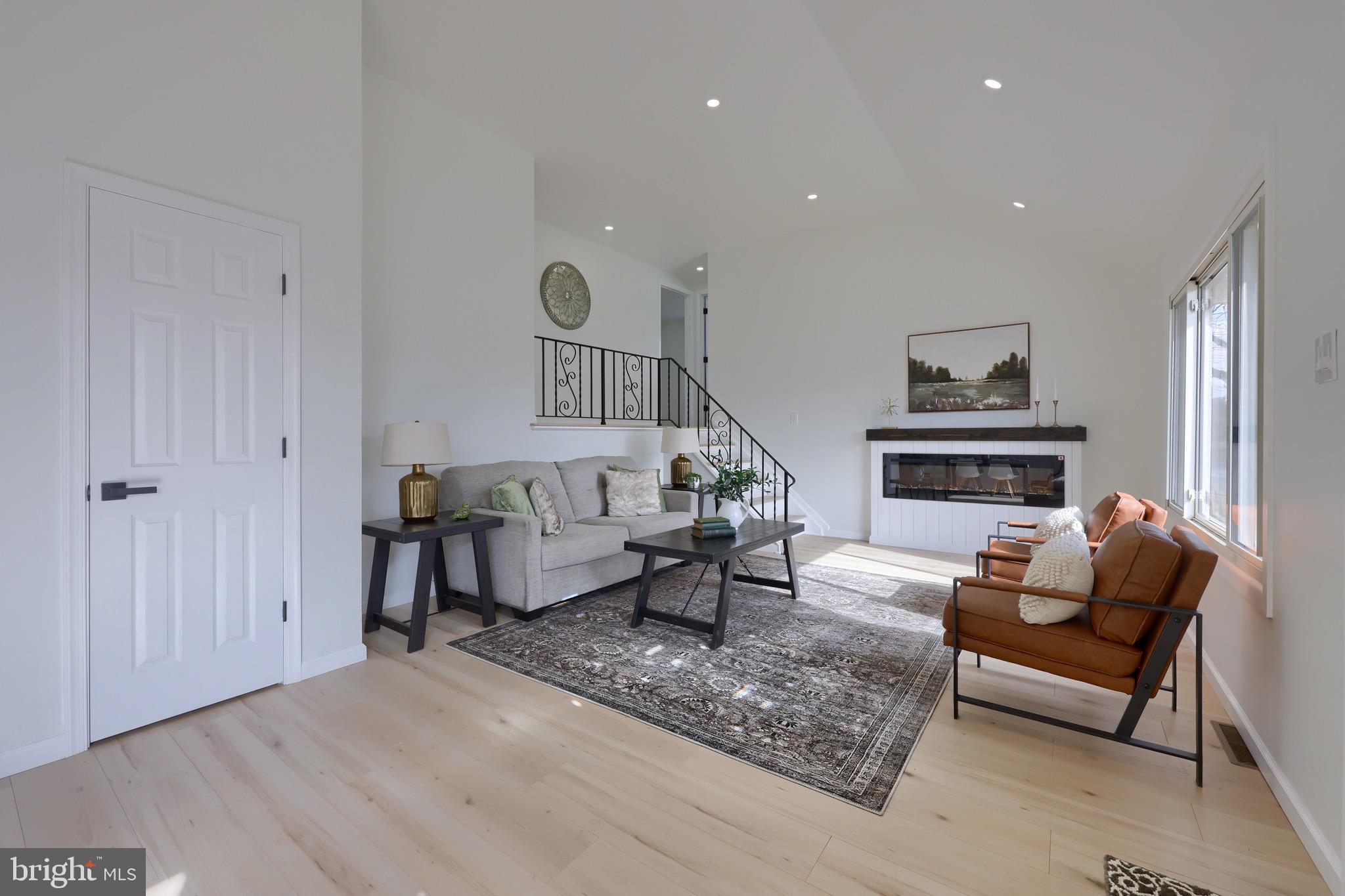 2709 Chapel Road Lancaster, PA 17603 - Photo 10 of 67 a living room with furniture and a fireplace