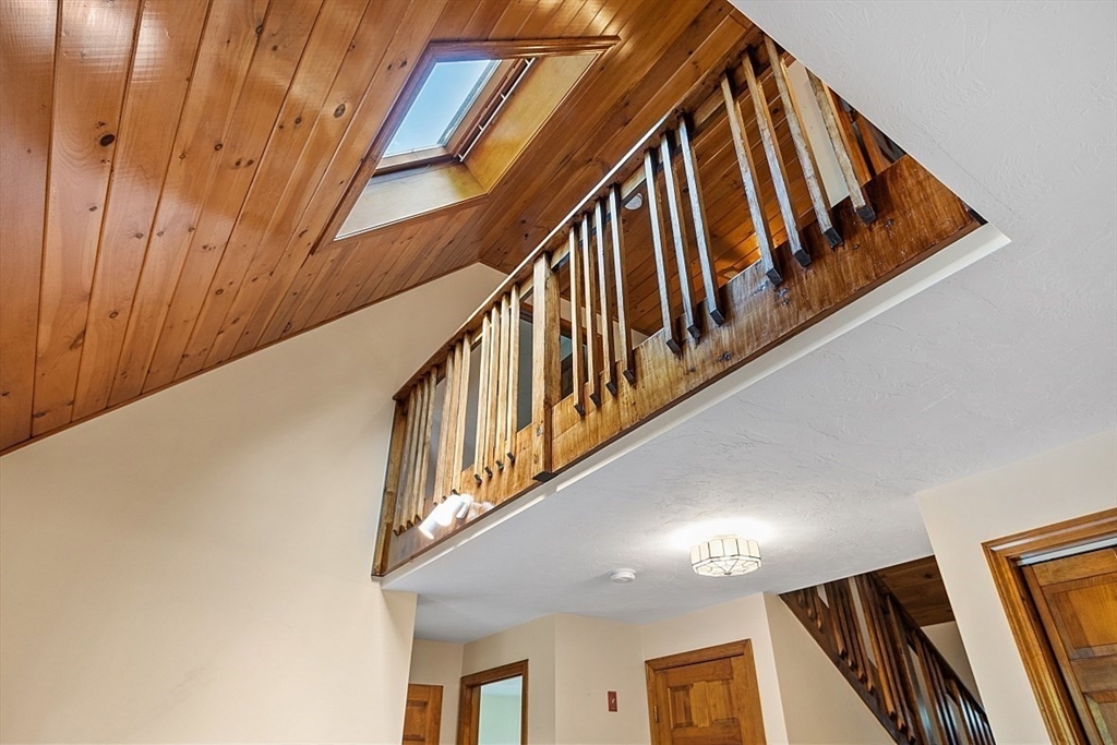 58 Peabody Road, Unit B Shirley, MA 01464 - Photo 13 of 38 a view of staircase with wooden floor and fan