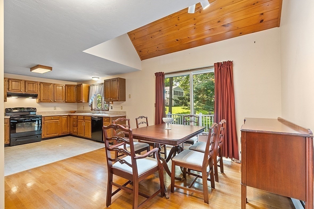 58 Peabody Road, Unit B Shirley, MA 01464 - Photo 19 of 38 a view of a dining room with furniture and kitchen view
