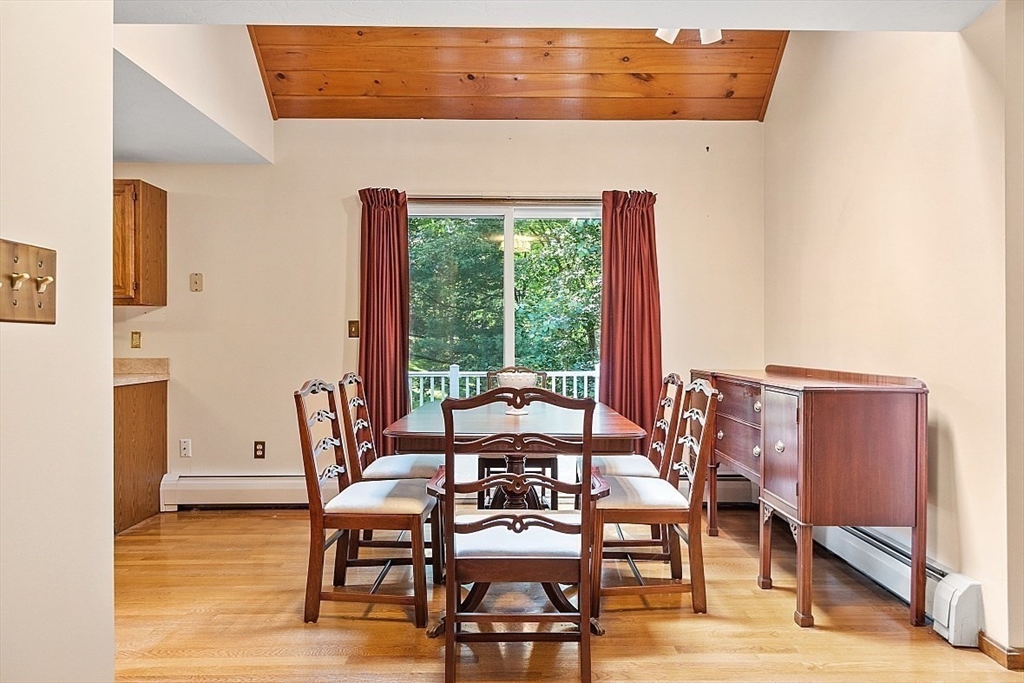 58 Peabody Road, Unit B Shirley, MA 01464 - Photo 20 of 38 a dining room with furniture and wooden floor