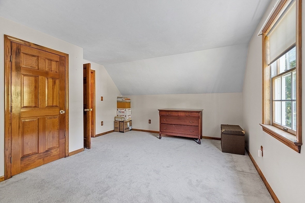 58 Peabody Road, Unit B Shirley, MA 01464 - Photo 24 of 38 an empty room with windows and closet