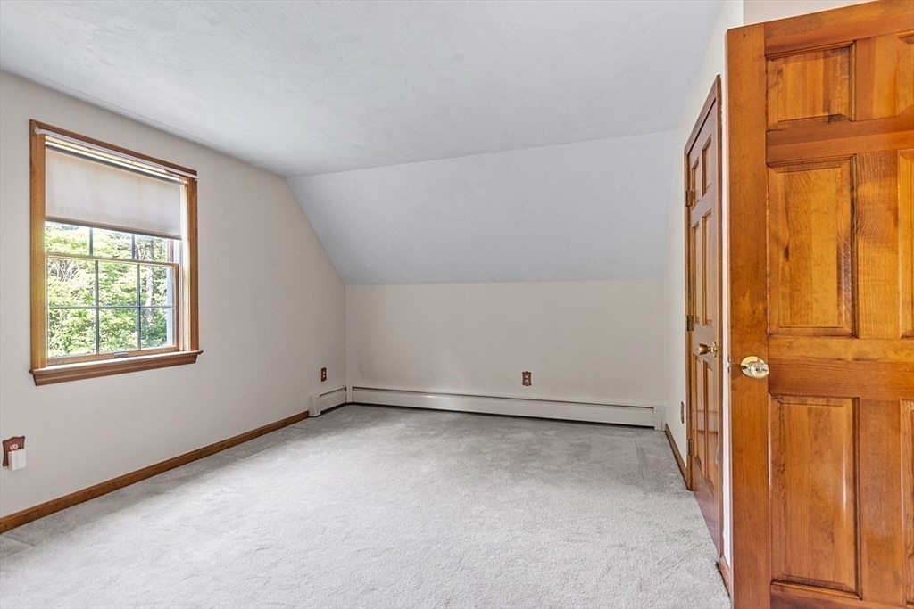 58 Peabody Road, Unit B Shirley, MA 01464 - Photo 27 of 38 an empty room with windows