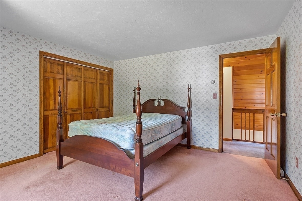 58 Peabody Road, Unit B Shirley, MA 01464 - Photo 33 of 38 a bedroom with a bed and a window