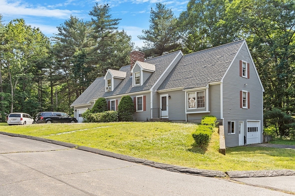 58 Peabody Road, Unit B Shirley, MA 01464 - Photo 38 of 38 a view of a house with swimming pool next to a yard