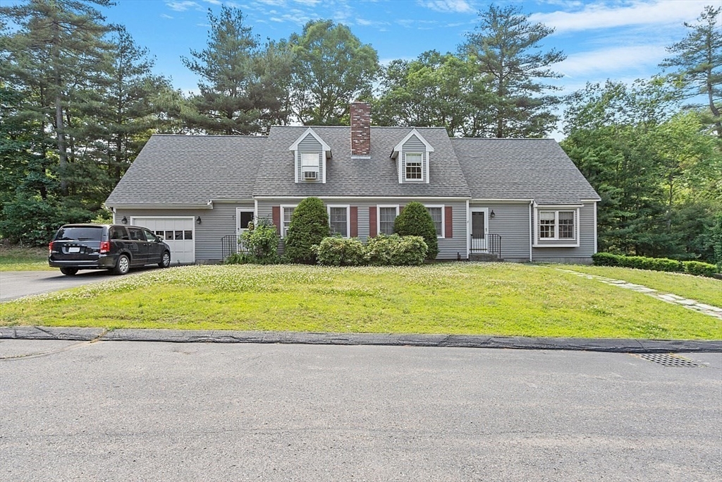 58 Peabody Road, Unit B Shirley, MA 01464 - Photo 4 of 38 a house view with a outdoor space