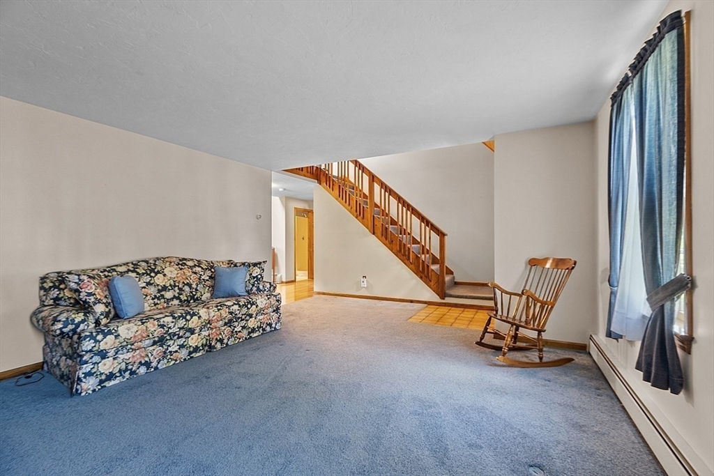 58 Peabody Road, Unit B Shirley, MA 01464 - Photo 10 of 38 a view of an empty room with windows