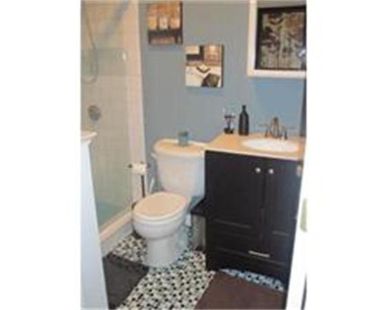 346 West 3rd Street, Unit 21 Boston, MA 02127 - Photo 7 of 11 a bathroom with a sink and a toilet