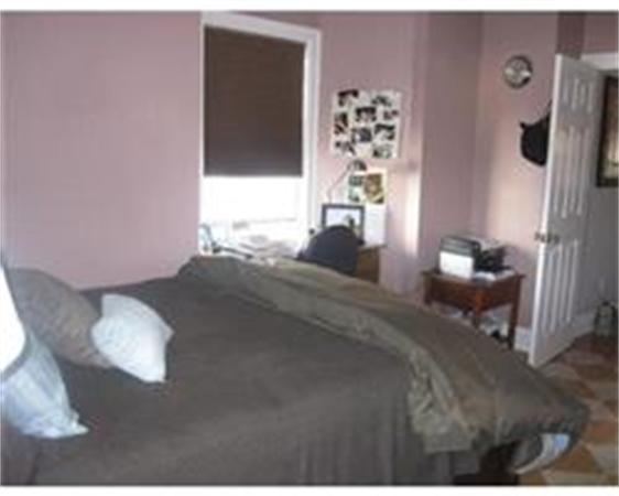 346 West 3rd Street, Unit 21 Boston, MA 02127 - Photo 9 of 11 a bedroom with a bed and a window