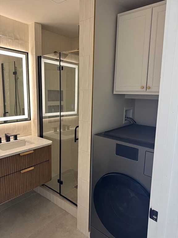 36 Sunapee Street Springfield, MA 01108 - Photo 11 of 18 a bathroom with a sink and a mirror