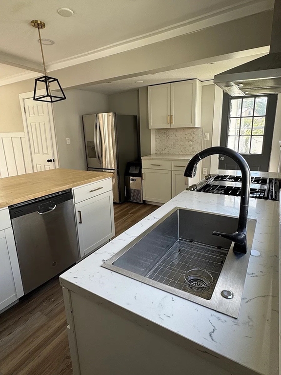 36 Sunapee Street Springfield, MA 01108 - Photo 3 of 18 a kitchen with stainless steel appliances granite countertop a sink stove and refrigerator