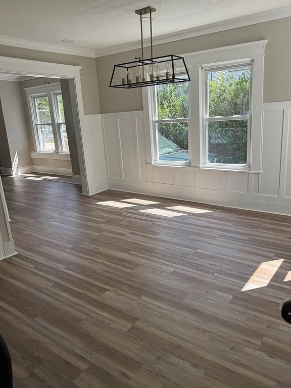36 Sunapee Street Springfield, MA 01108 - Photo 5 of 18 a view of an empty room with wooden floor and a window