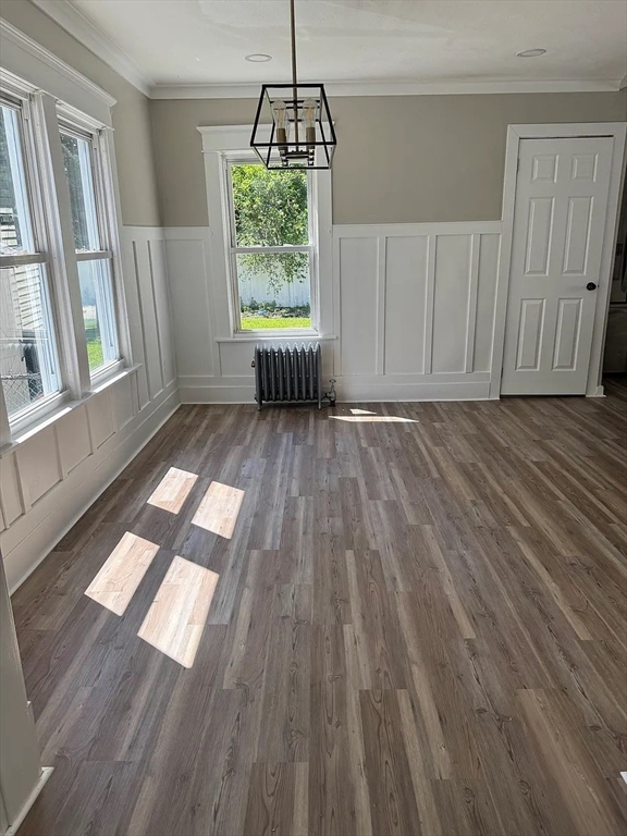 36 Sunapee Street Springfield, MA 01108 - Photo 6 of 18 a view of empty room with wooden floor and fan