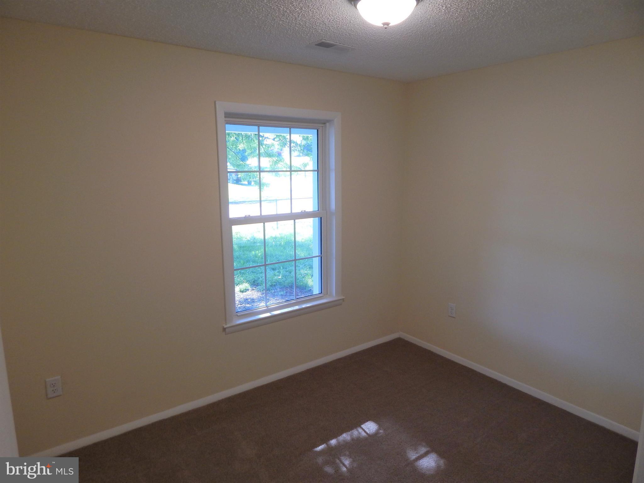 138 Lemon Road Ranson, WV 25438 - Photo 13 of 29 an empty room with a window