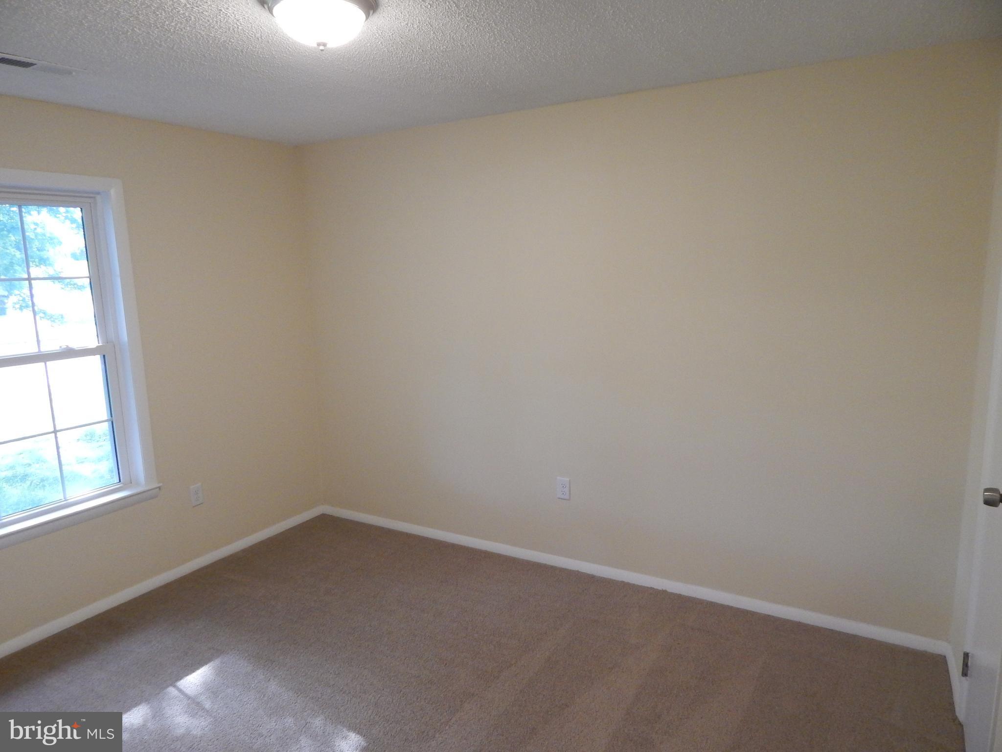 138 Lemon Road Ranson, WV 25438 - Photo 14 of 29 an empty room with a window