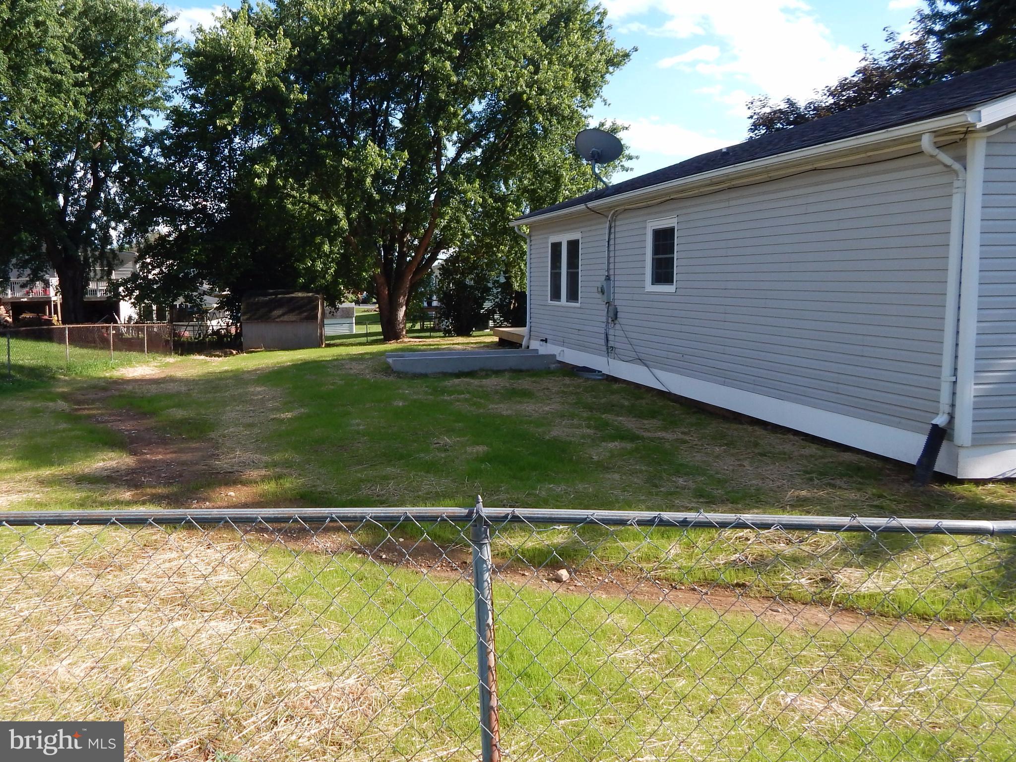 138 Lemon Road Ranson, WV 25438 - Photo 27 of 29 a view of swimming pool with a yard