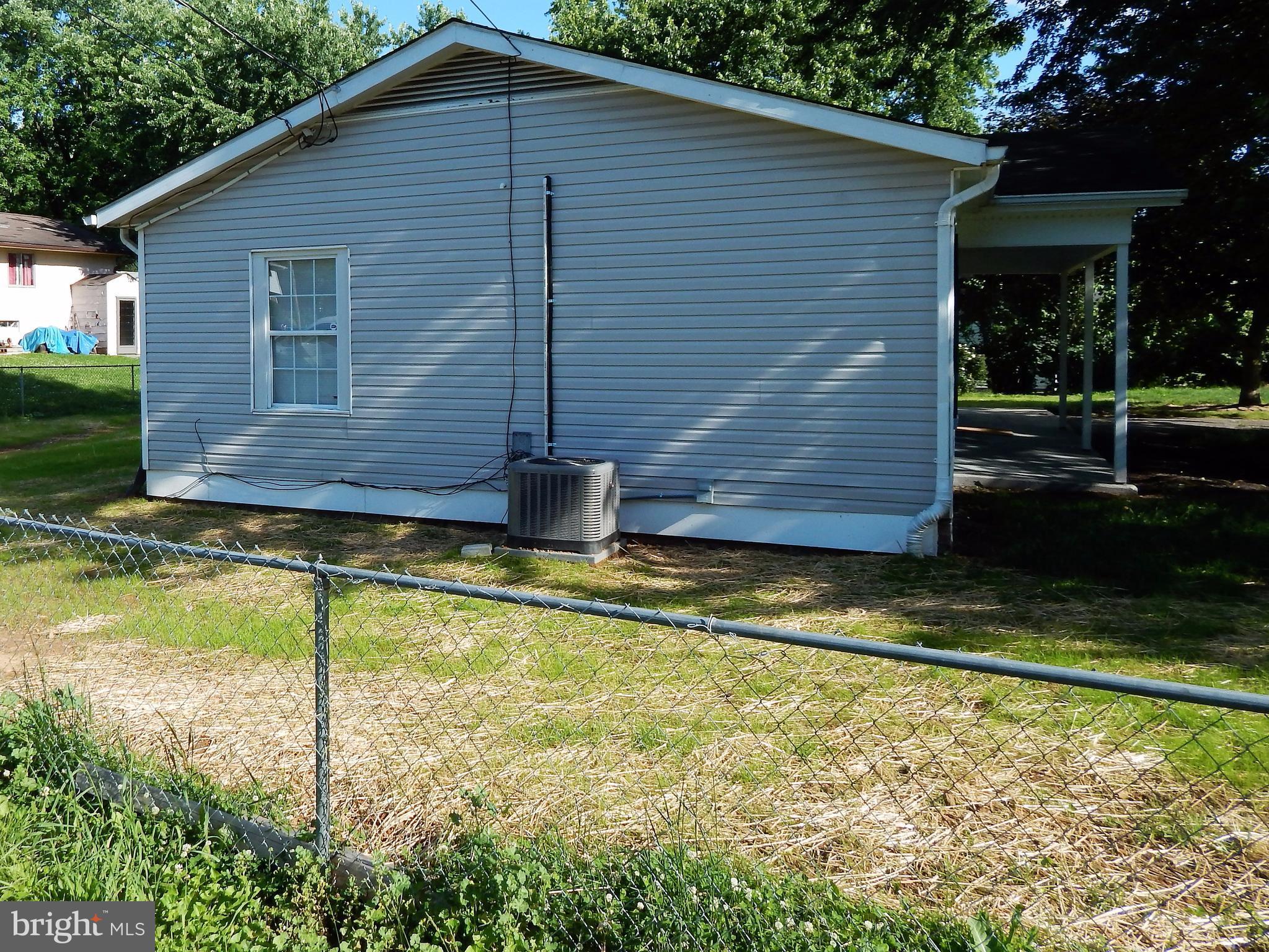 138 Lemon Road Ranson, WV 25438 - Photo 28 of 29 a view of a house with a yard