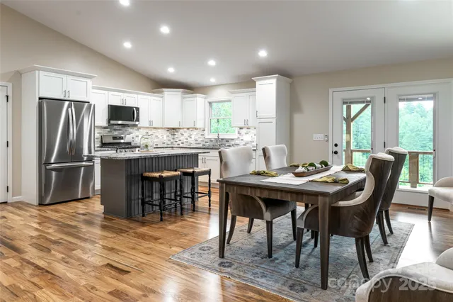 a view of a balcony with wooden floor