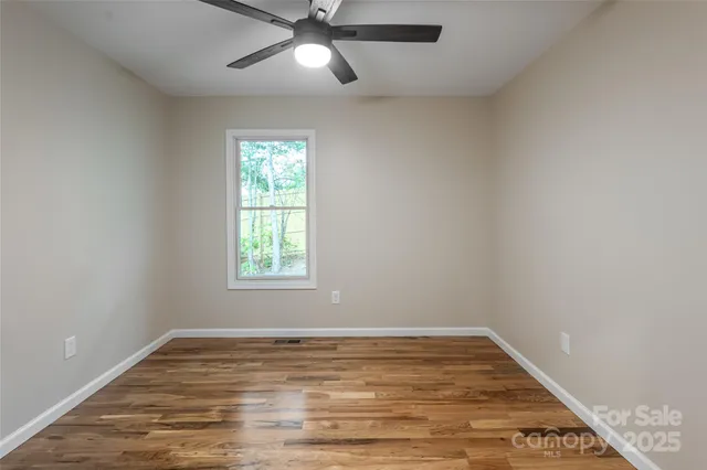 a view of backyard with green space