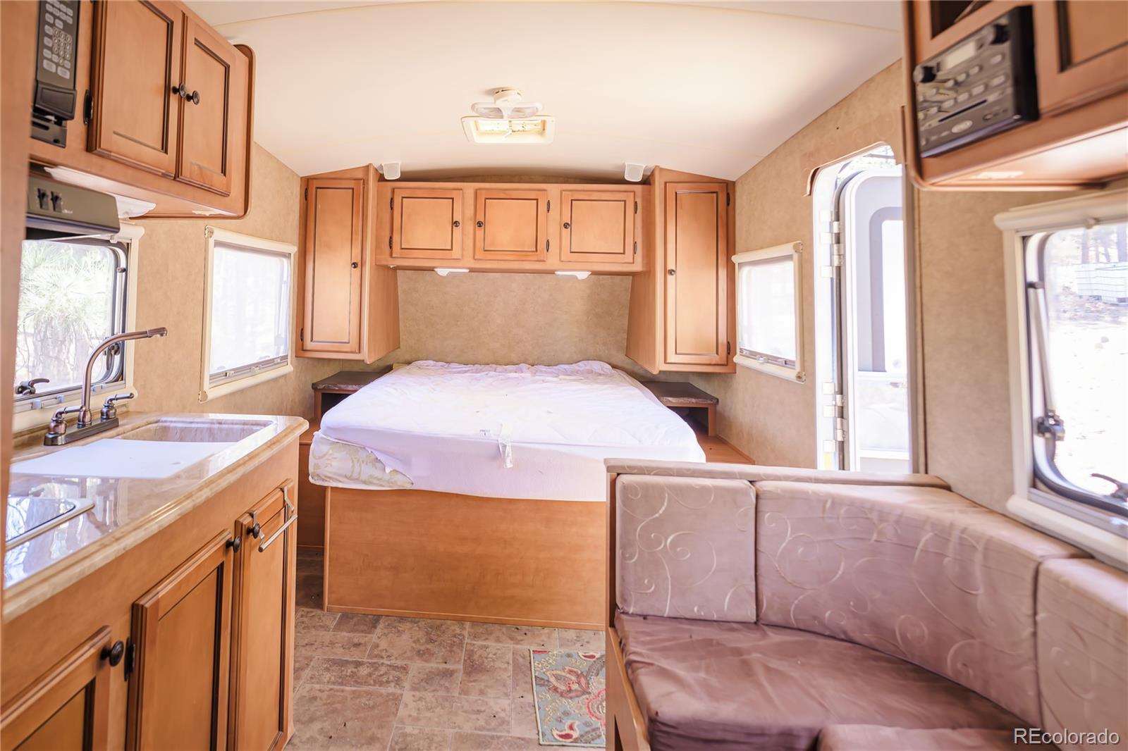 17990 King Road Weston, CO 81091 - Photo 13 of 49 a bedroom with a bed and a dresser