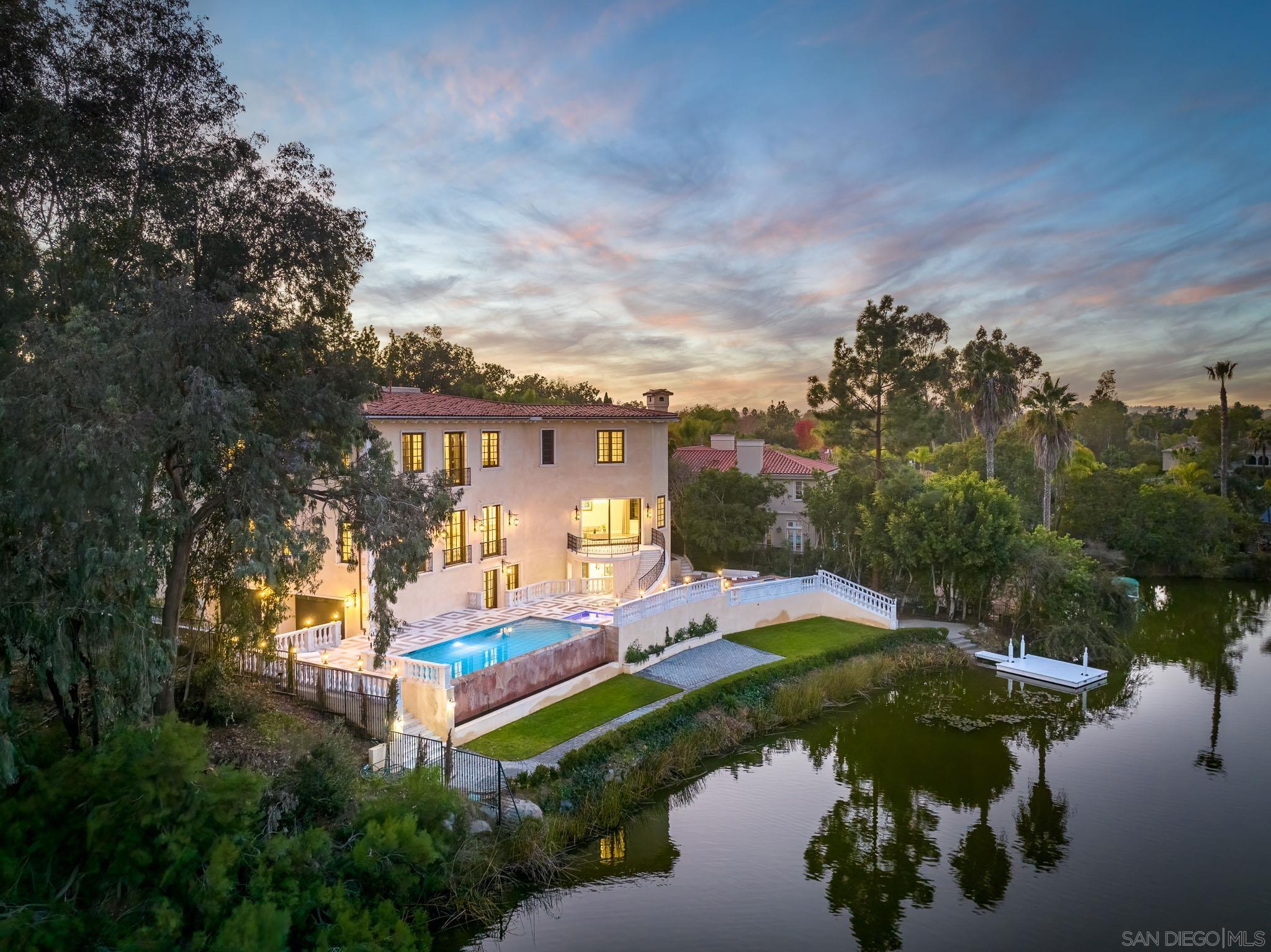 17176 Calle Serena Rancho Santa Fe, CA 92067 - Photo 1 of 59 a aerial view of a house with a yard basket ball court and outdoor seating