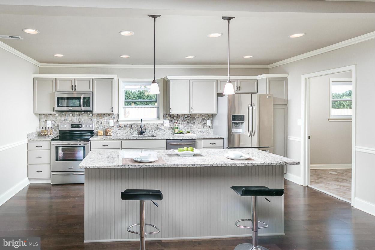 17337 Troyer Road Monkton, MD 21111 - Photo 3 of 30 Gourmet Kitchen with Island Breakfast Bar!