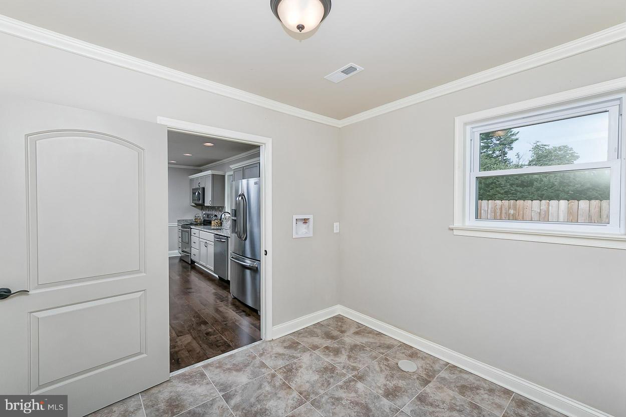 17337 Troyer Road Monkton, MD 21111 - Photo 25 of 30 Separate Laundry Rm w/Cer Tile Off Kitchen!