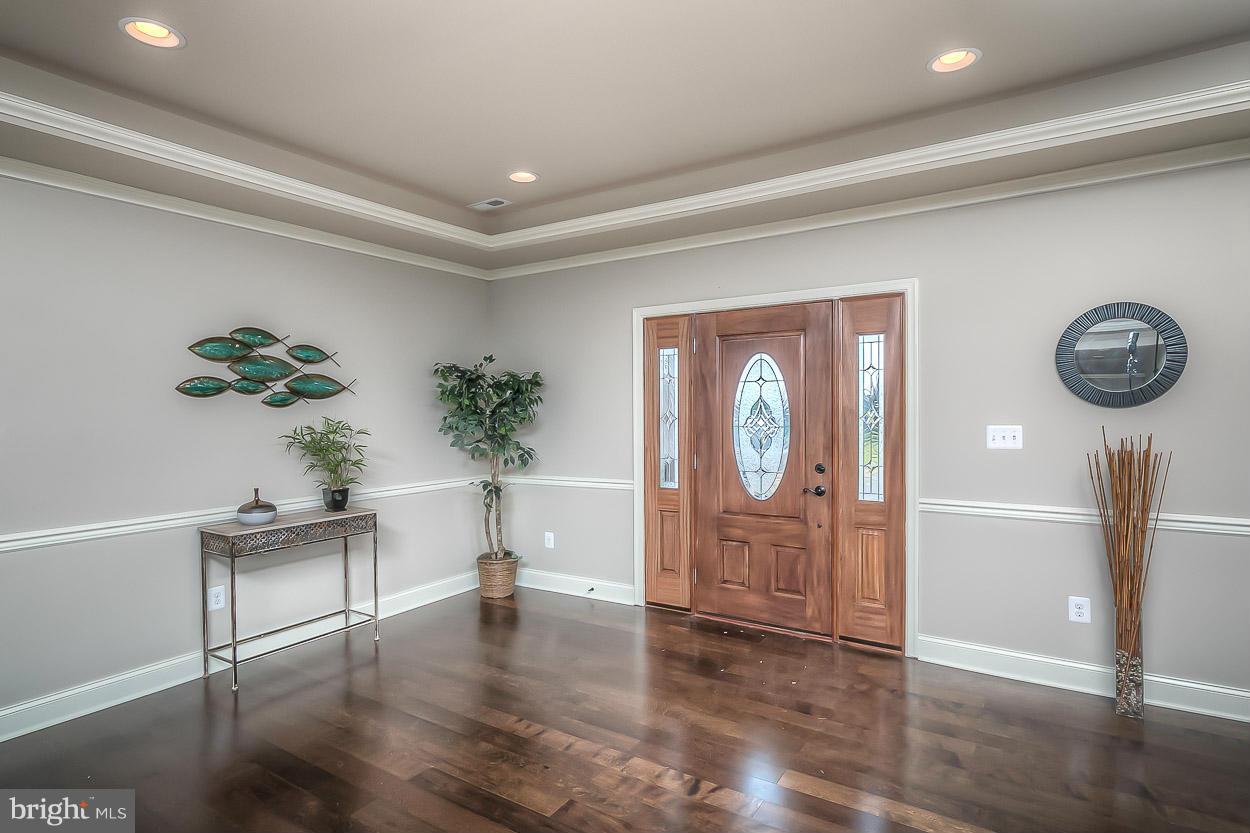 17337 Troyer Road Monkton, MD 21111 - Photo 6 of 30 Front Entryway! Chair Railing! Crown Molding!