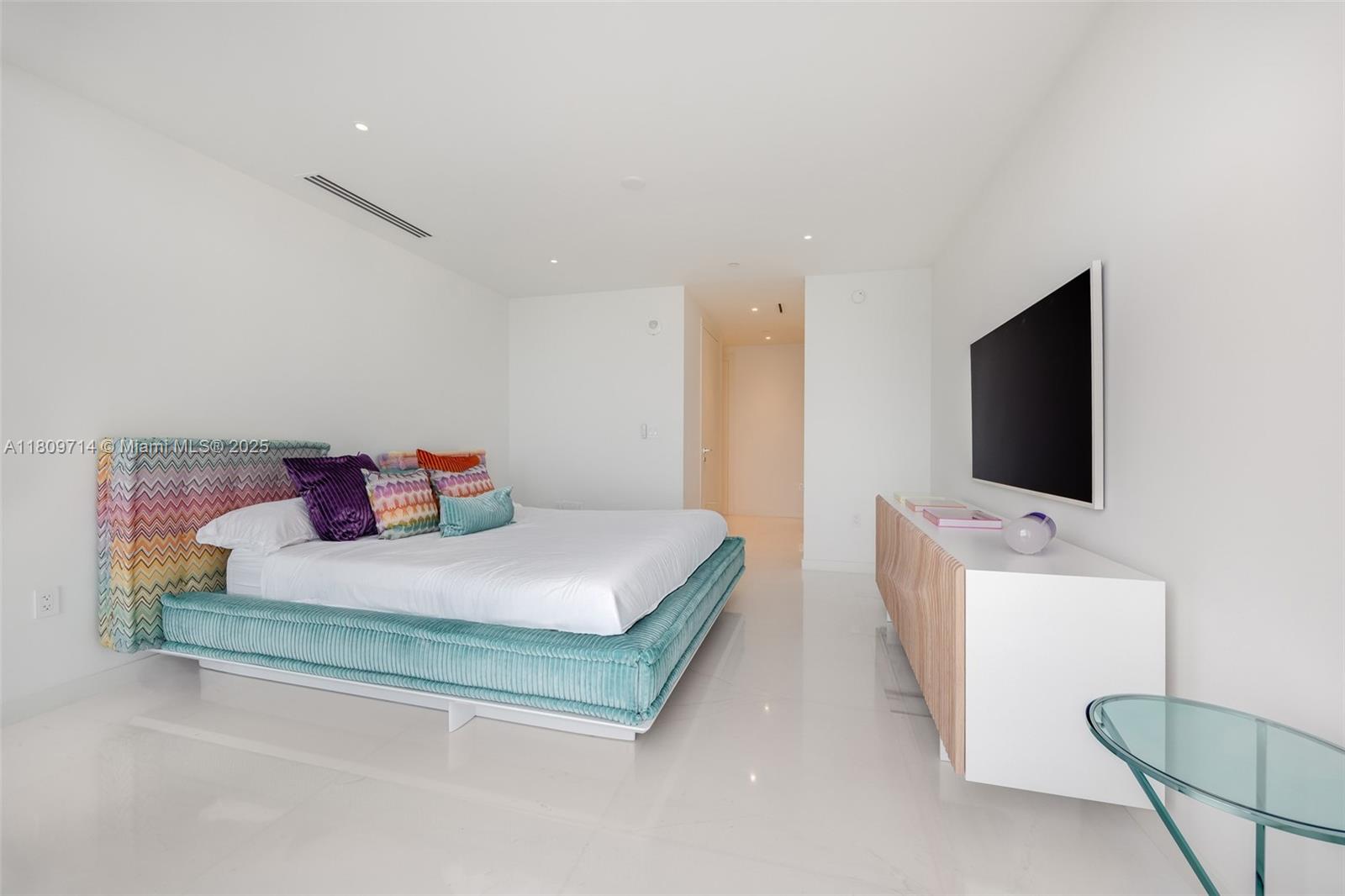 300 Biscayne Blvd Way, Unit 5205W Miami, FL 33131 - Photo 12 of 40 a bedroom with a bed and a flat screen tv