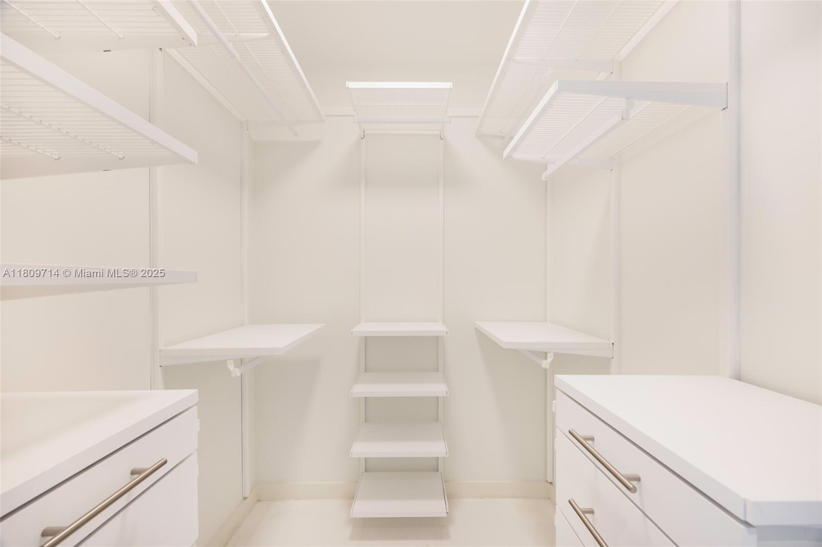 300 Biscayne Blvd Way, Unit 5205W Miami, FL 33131 - Photo 13 of 40 a bathroom with a sink a toilet and a shower