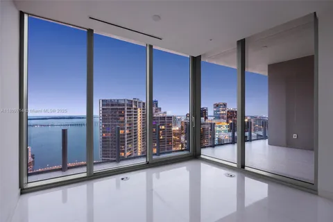 a bathroom with a toilet sink and shower