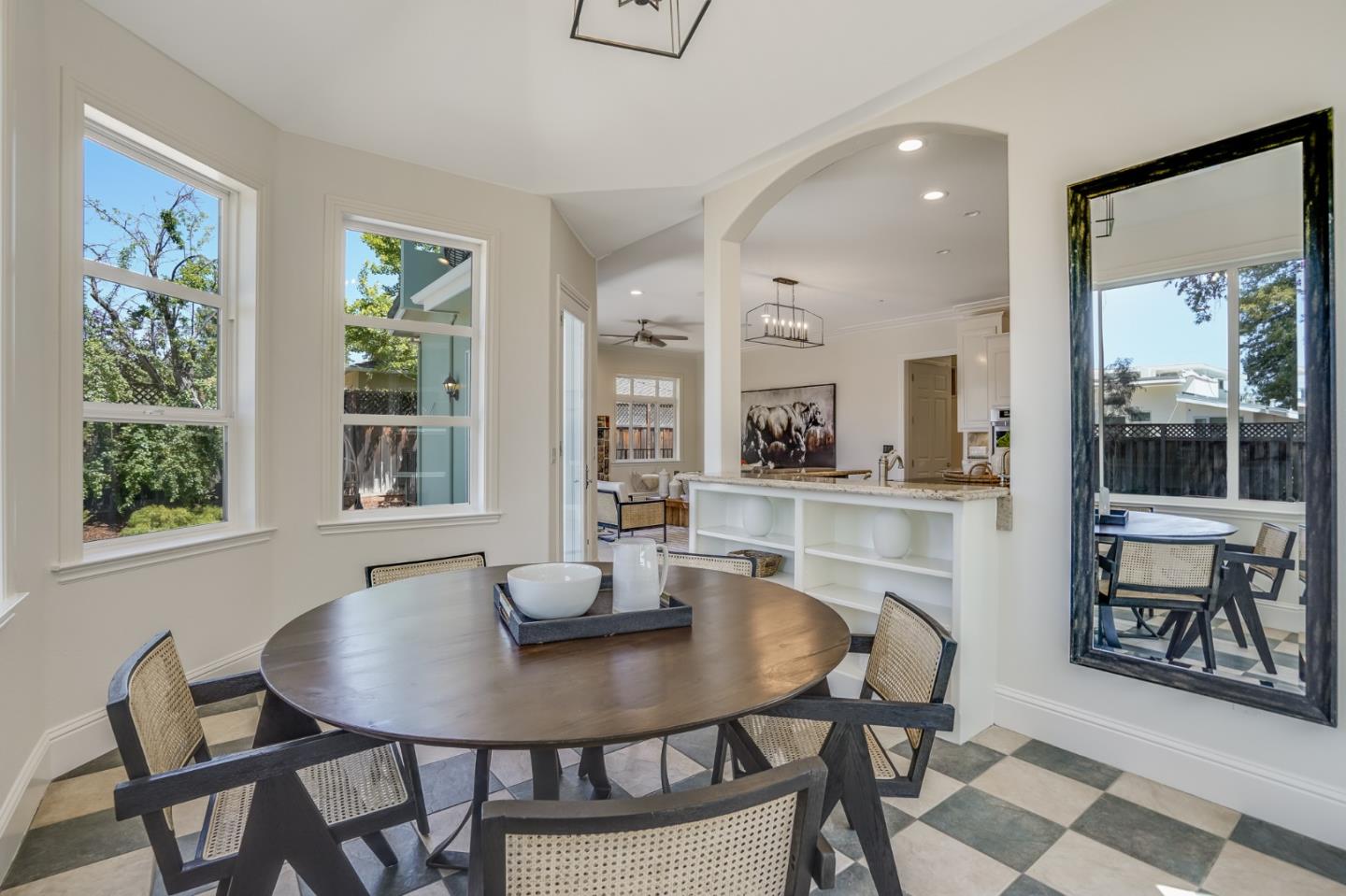 1161 Payne Drive Los Altos, CA 94024 - Photo 15 of 48 a view of a dining room with furniture and a potted plant