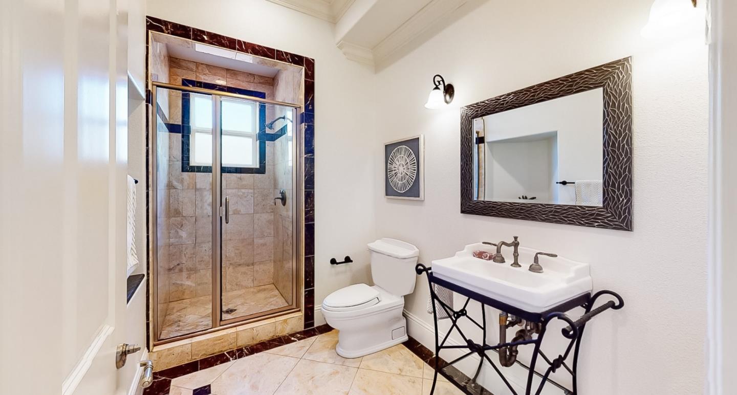 1161 Payne Drive Los Altos, CA 94024 - Photo 21 of 48 a bathroom with a toilet a sink and mirror