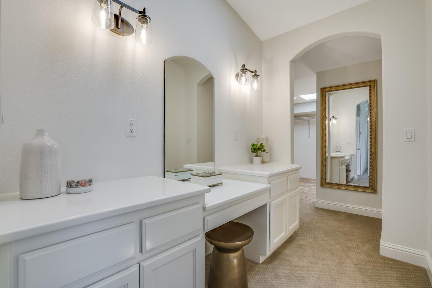 1161 Payne Drive Los Altos, CA 94024 - Photo 38 of 48 a spacious bathroom with a sink and a mirror