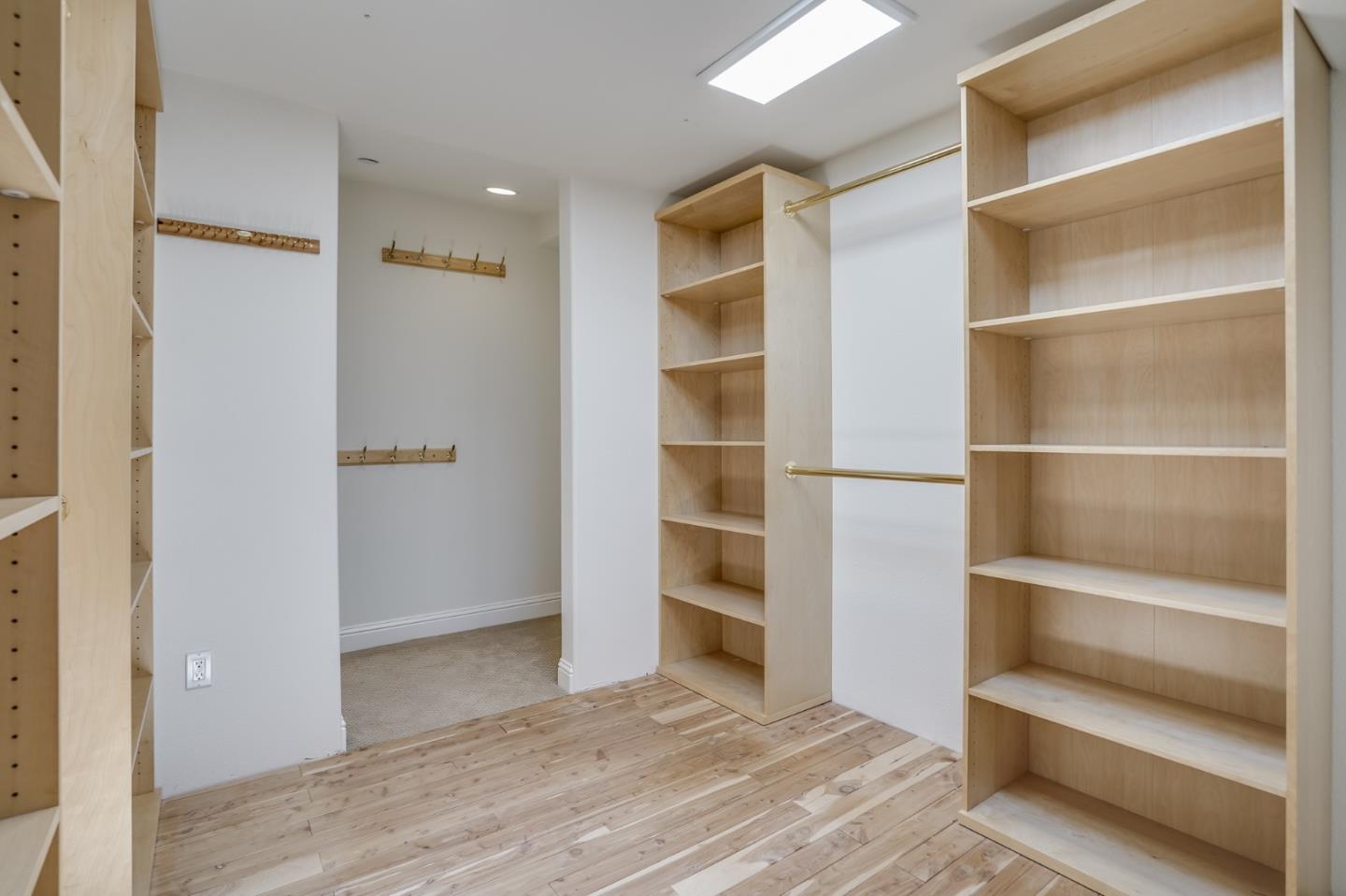 1161 Payne Drive Los Altos, CA 94024 - Photo 41 of 48 a view of closet area with empty racks