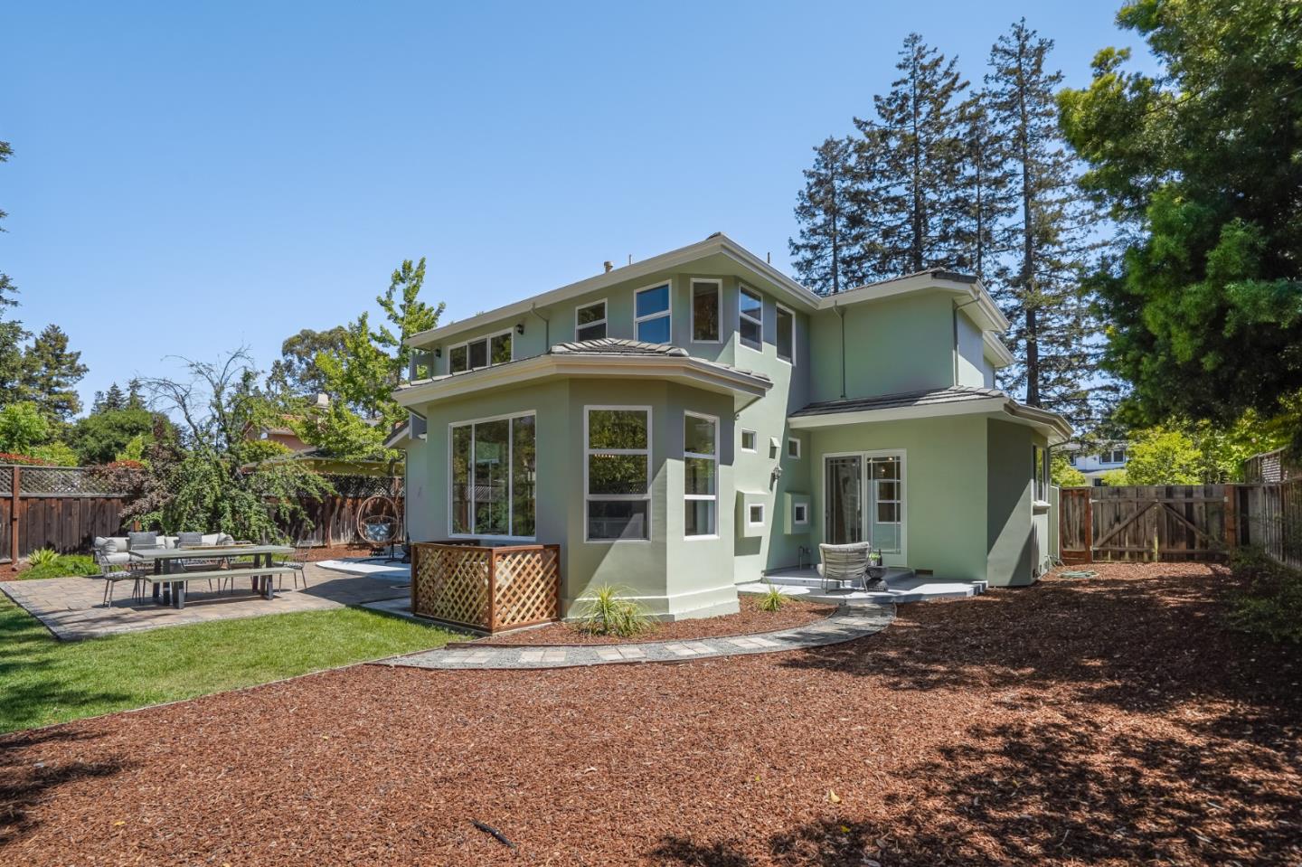 1161 Payne Drive Los Altos, CA 94024 - Photo 43 of 48 a front view of a house with a yard and potted plants