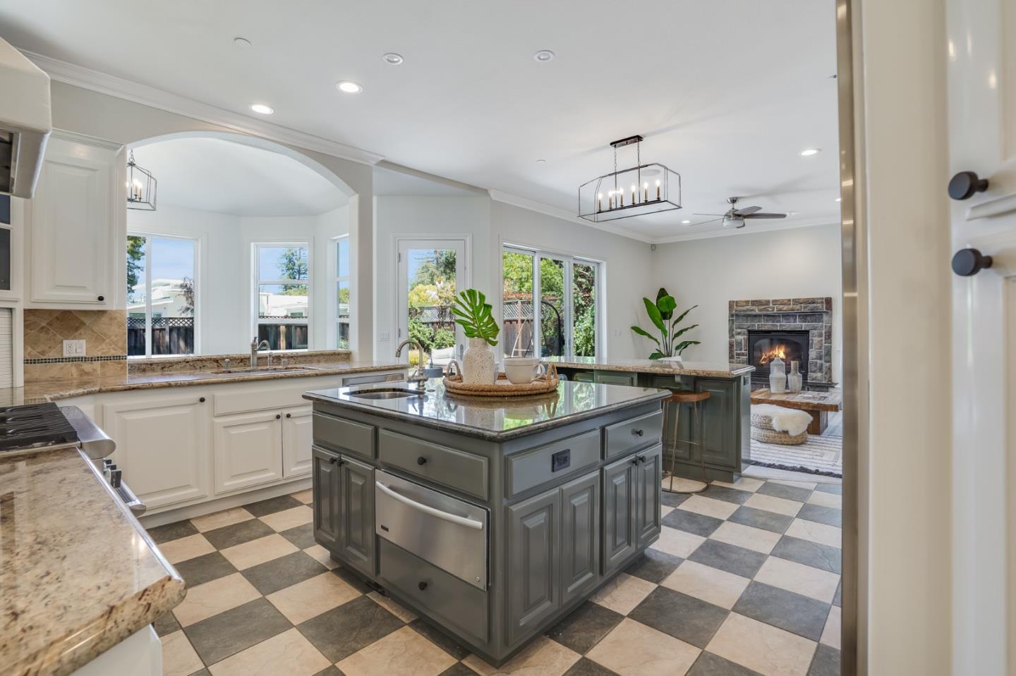 1161 Payne Drive Los Altos, CA 94024 - Photo 9 of 48 a kitchen with stainless steel appliances granite countertop a stove a sink and a refrigerator
