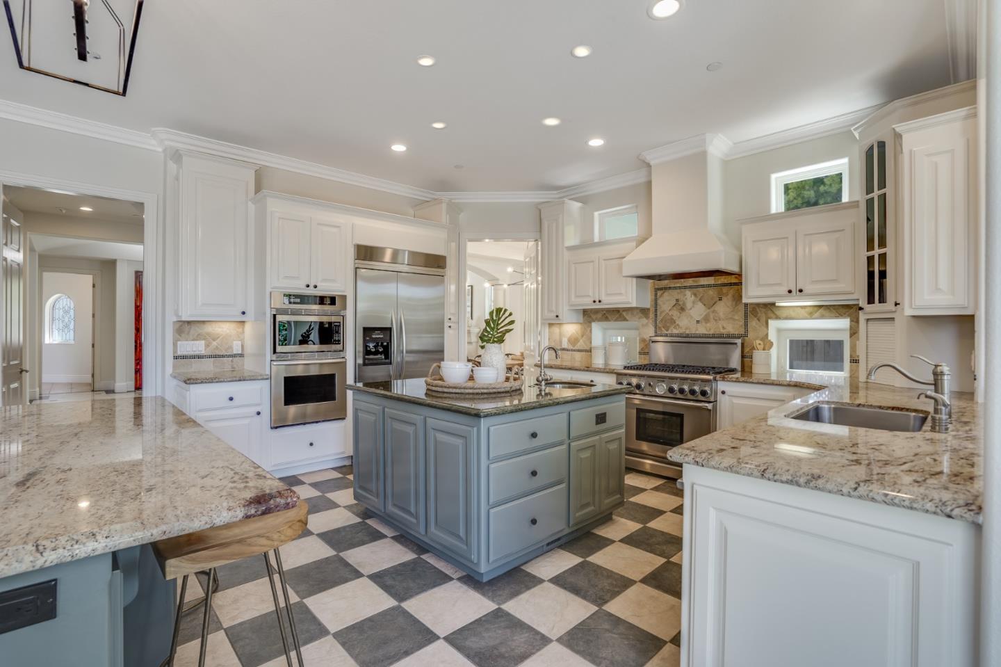 1161 Payne Drive Los Altos, CA 94024 - Photo 10 of 48 a large kitchen with stainless steel appliances granite countertop a stove top oven a sink dishwasher and a refrigerator