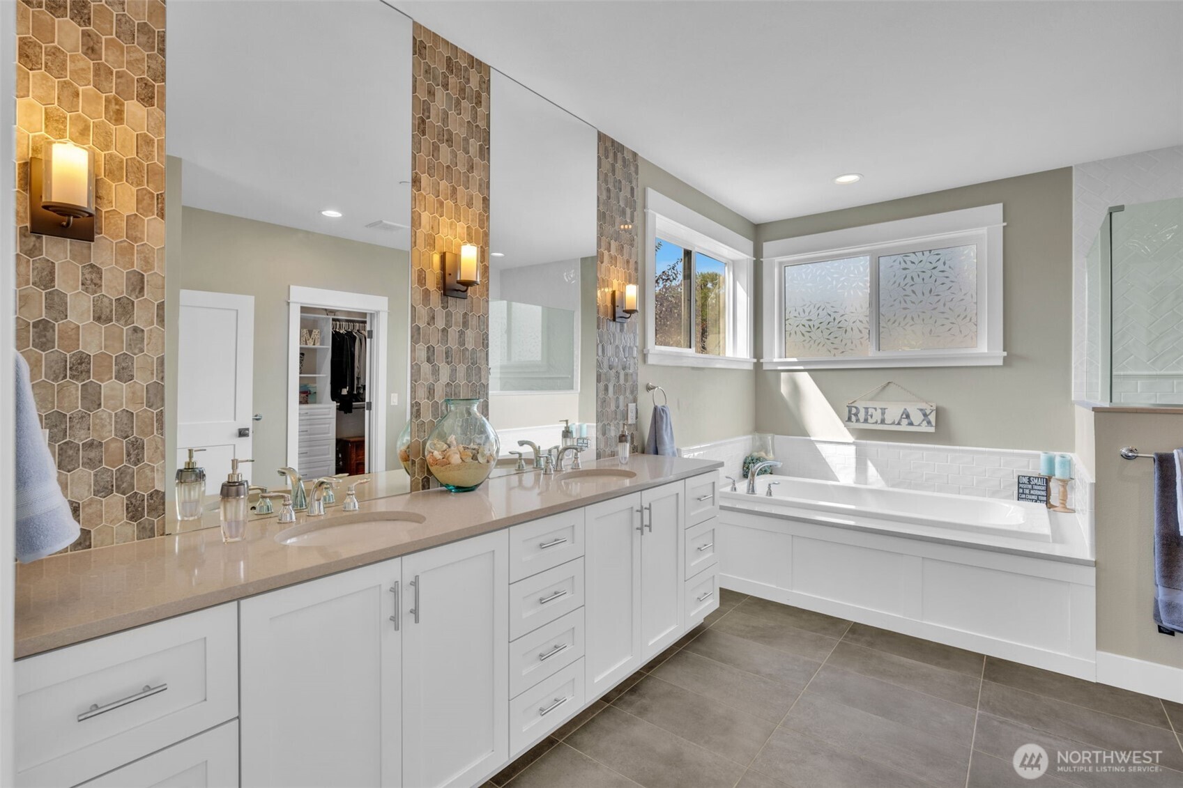 23216 9th Avenue Southeast Bothell, WA 98021 - Photo 23 of 40 a spacious bathroom with a granite countertop sink mirror and bathtub