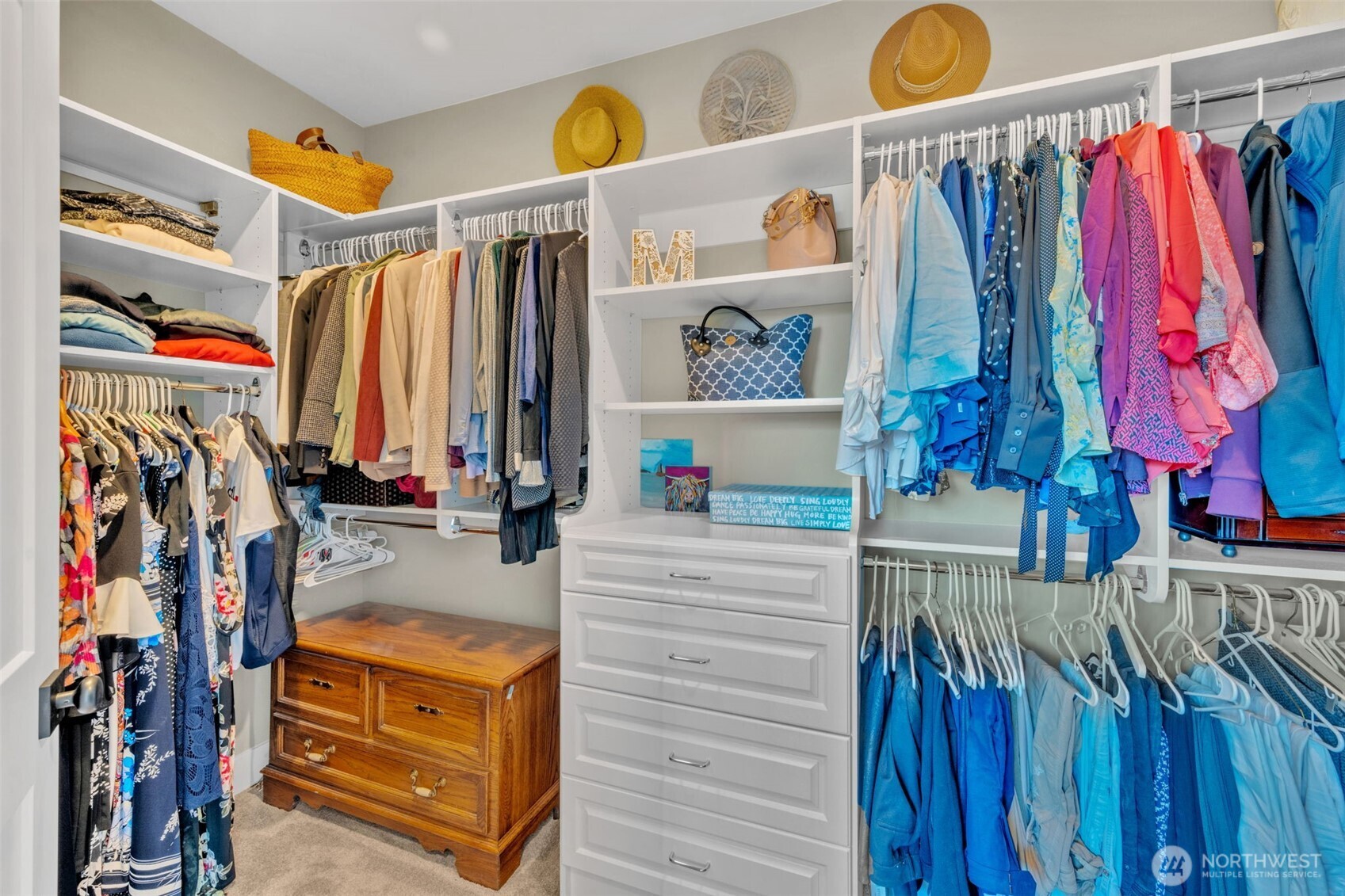 23216 9th Avenue Southeast Bothell, WA 98021 - Photo 26 of 40 a view of walk in closet with clothes and shoes