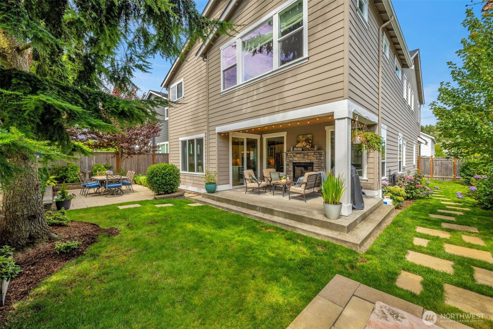 23216 9th Avenue Southeast Bothell, WA 98021 - Photo 35 of 40 a view of a house with backyard porch and sitting area