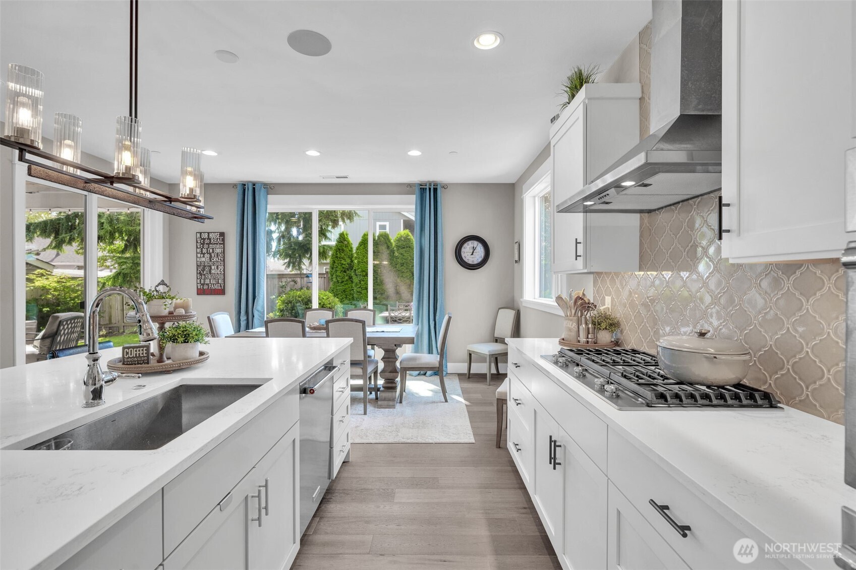 23216 9th Avenue Southeast Bothell, WA 98021 - Photo 6 of 40 a kitchen with stove a sink and cabinets