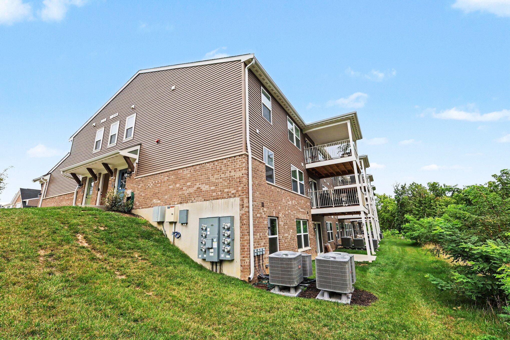 2455 Bella Ridge Fort Mitchell, KY 41017 - Photo 2 of 28 The middle deck with lovely wooded view