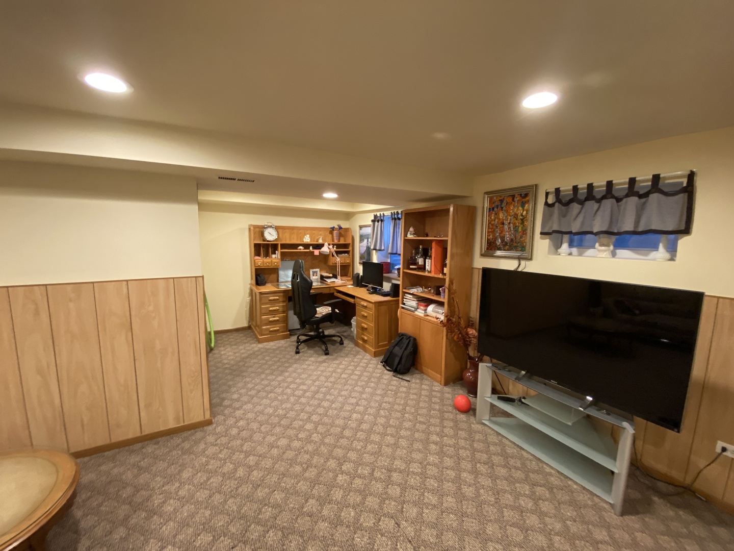 728 Inverrary Lane Deerfield, IL 60015 - Photo 14 of 15 a room with furniture and a flat screen tv