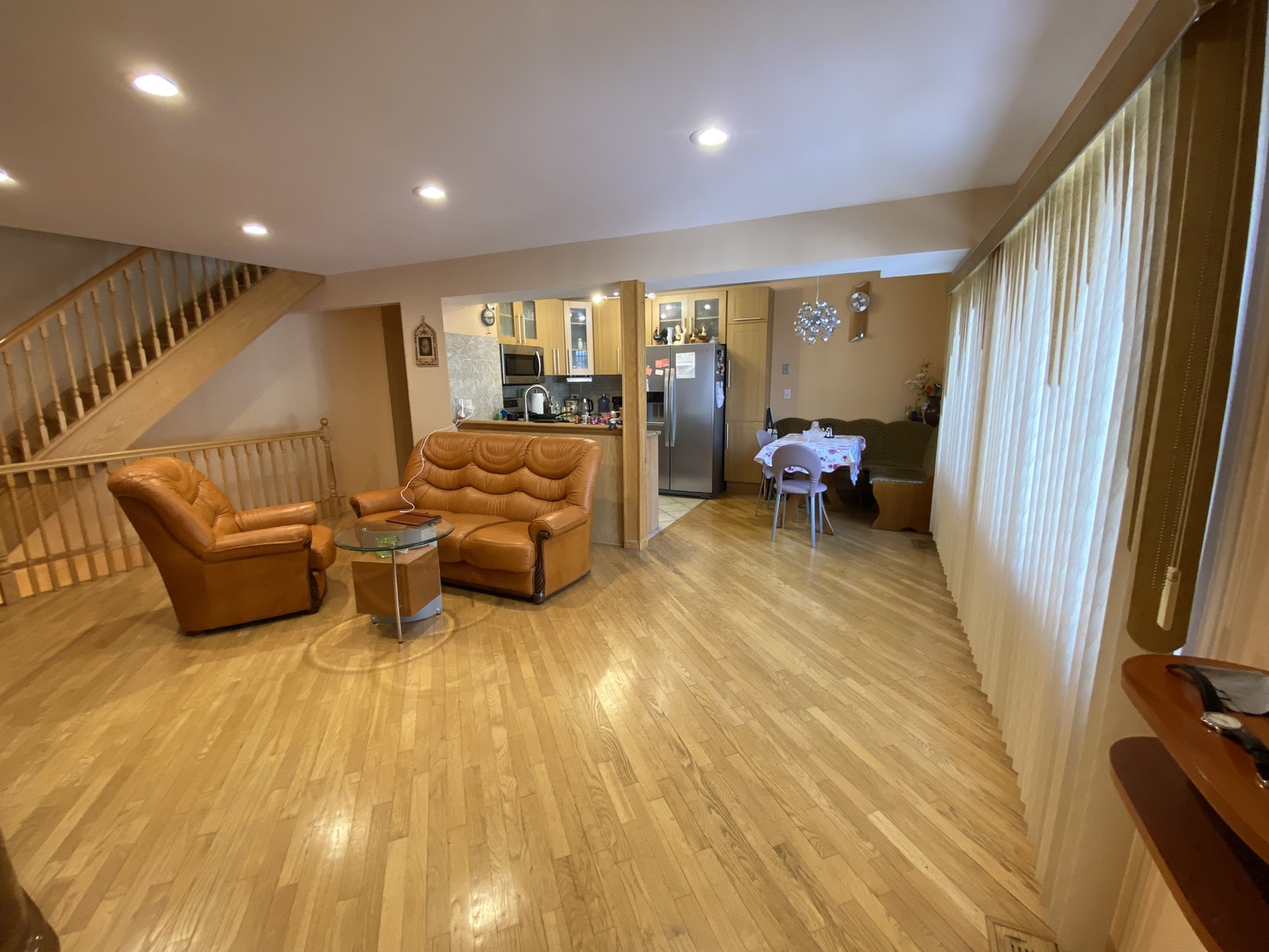 728 Inverrary Lane Deerfield, IL 60015 - Photo 2 of 15 a living room with furniture and a flat screen tv