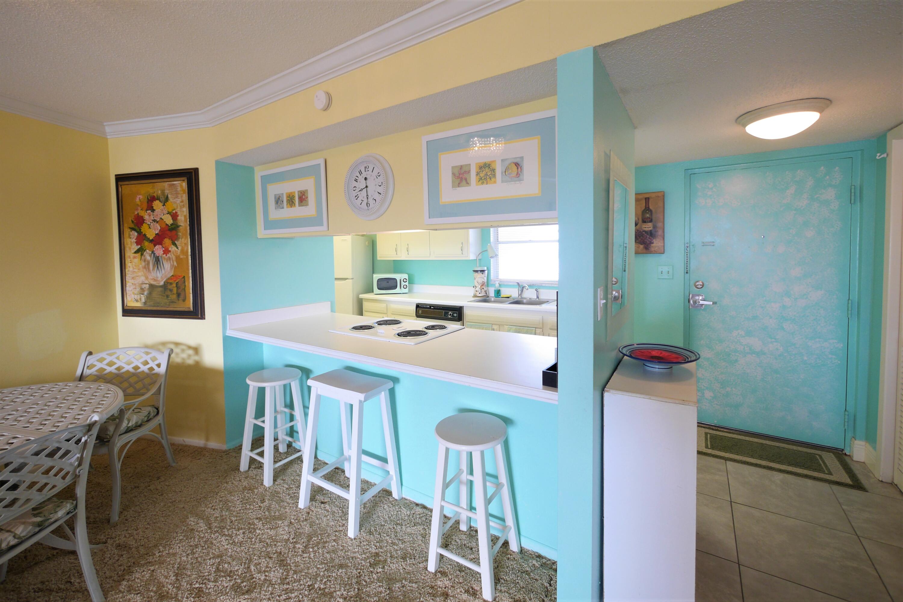 909 Santa Rosa Boulevard, Unit 265 Fort Walton Beach, FL 32548 - Photo 3 of 18 a dining room with furniture and window